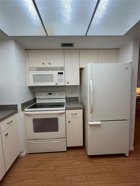 Range, microwave, and refrigerator