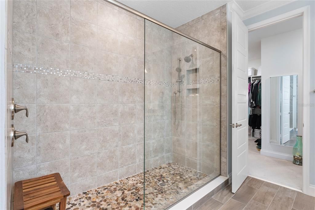 Primary bath Huge walk in shower with upgraded glass