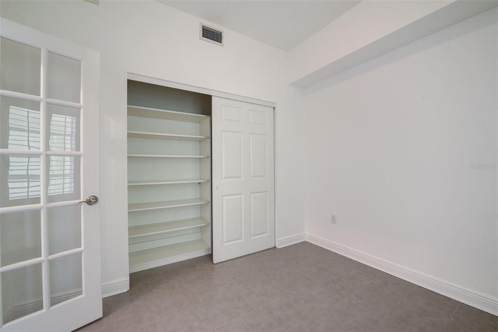 Closet with Shelves in Guest Room/Study