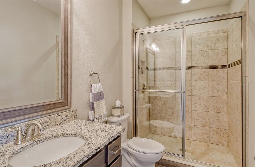 GUEST SUITE #2 WITH A BRIGHT NEUTRAL BATHROOM
