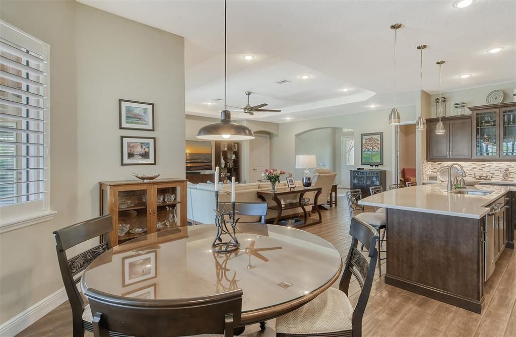 A GREAT ROOM , DINING AREA & LARGE ISLAND FOR BIG ENTERTAINING