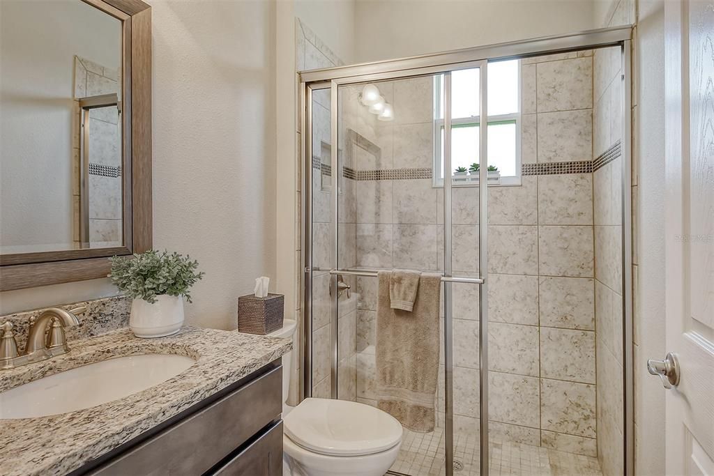 THE DEN/STUDY SHARES THIS IMMACULATE BATHJROOM, GREAT PROXIMITY TO THE POOL/SPA AS WELL