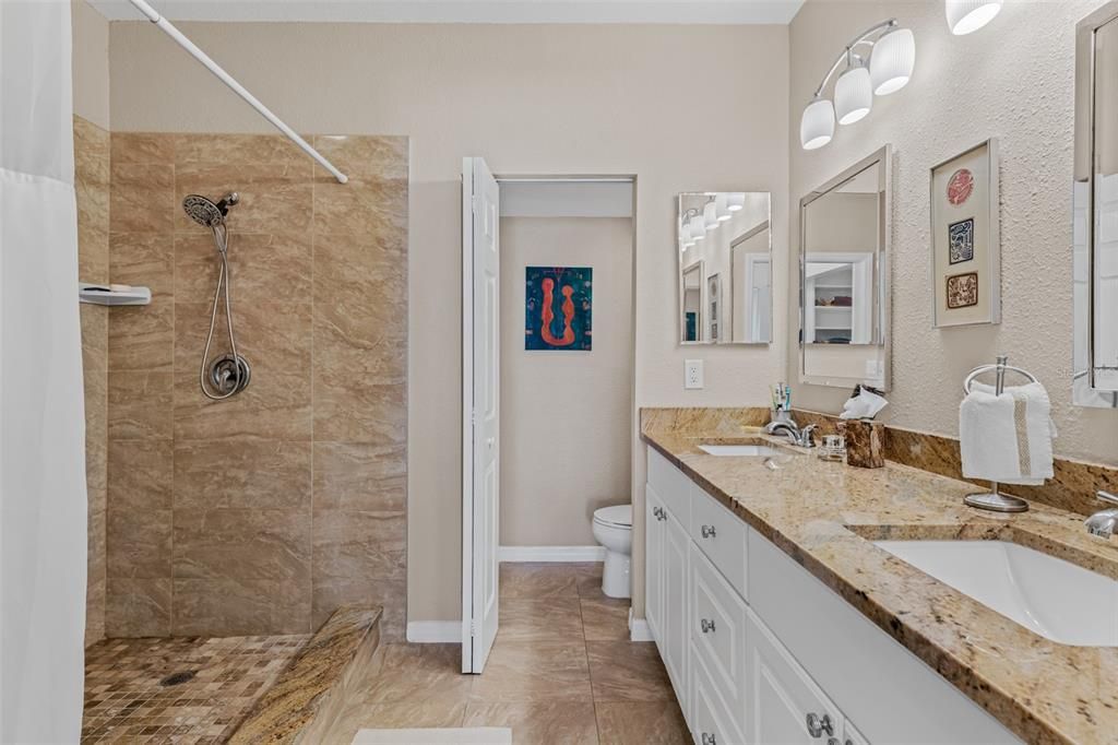 Spectacular primary shower and double sink vanity