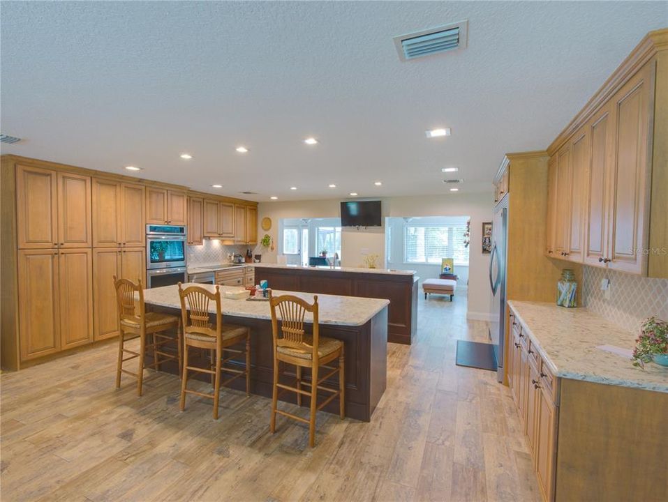 Huge built-in Stainless Frigidaire. 9 feet eat in counter. All quartz countertops.