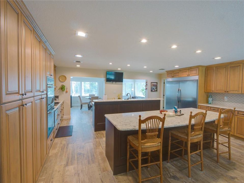 Huge built-in Stainless Frigidaire. 9 feet eat in counter. All quartz countertops.