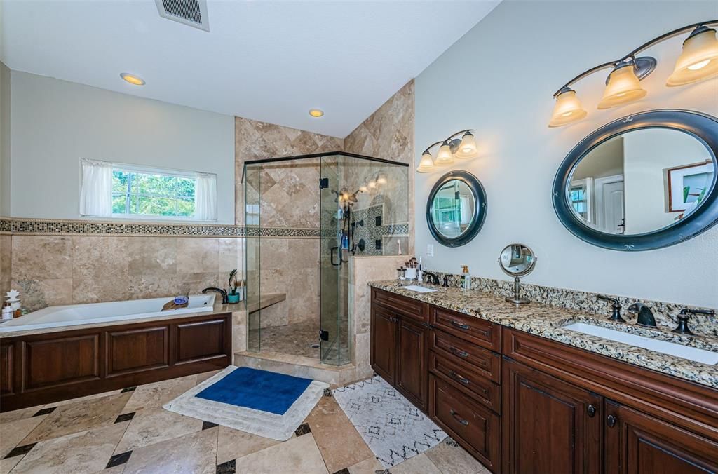 Master bathroom with jacuzzi tub and shower, double sinks