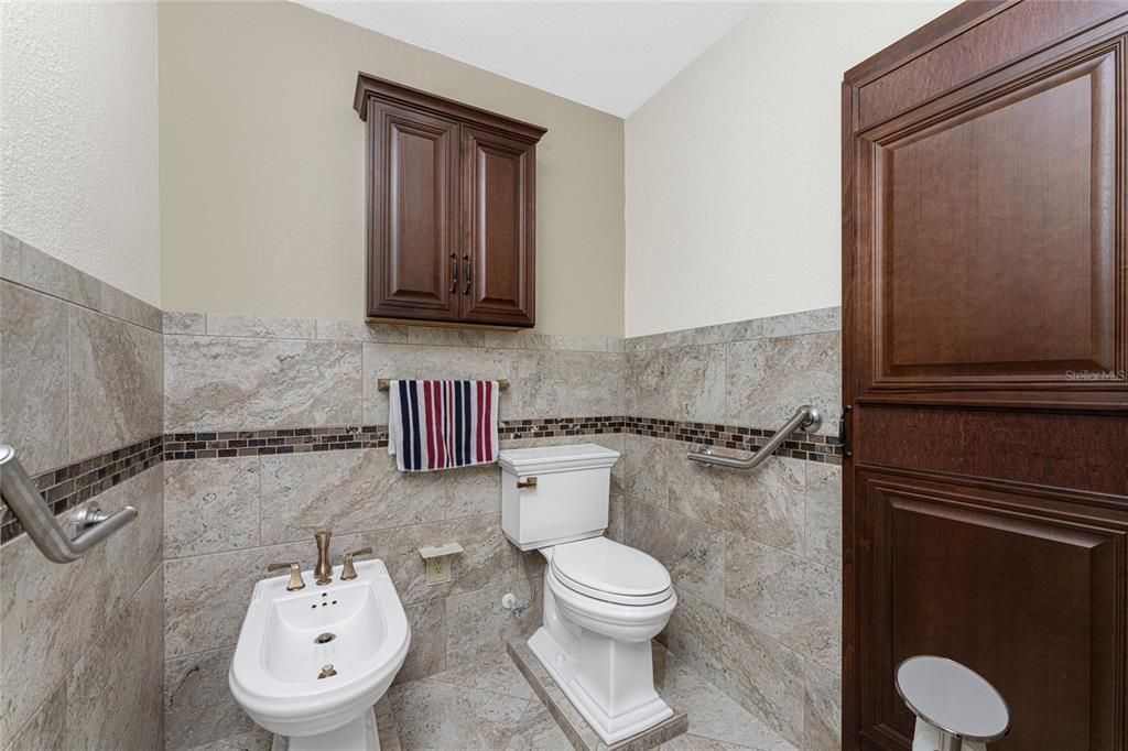Separate water closet with cabinets & bidet