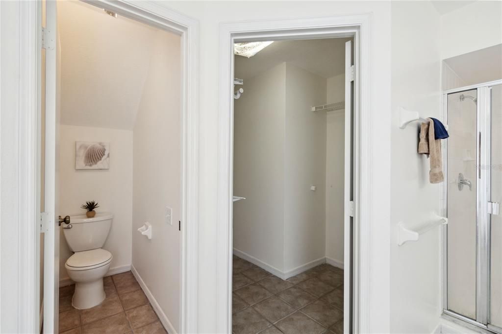 Private water closet with large walk in closet