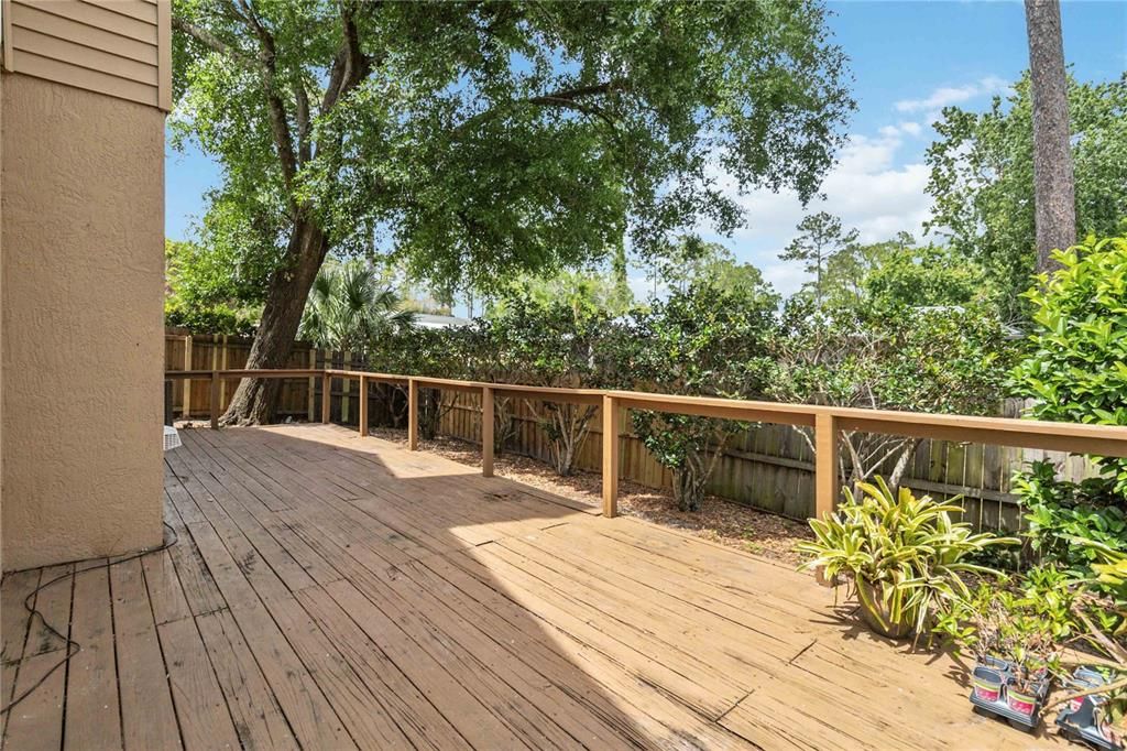 With a large wooden deck for entertaining
