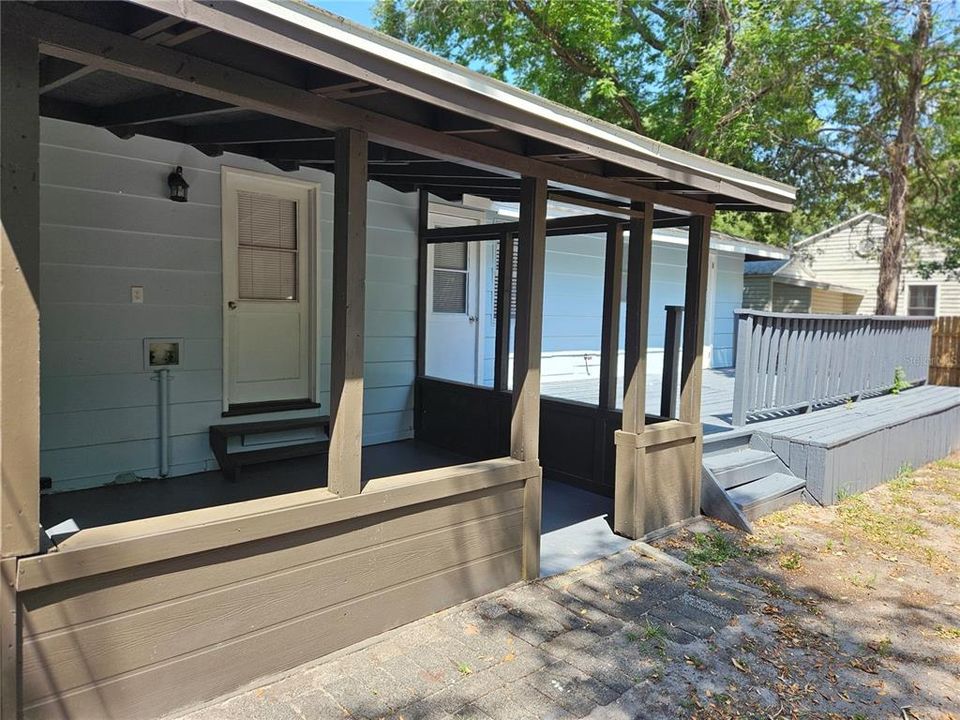 Covered rear porch and open deck