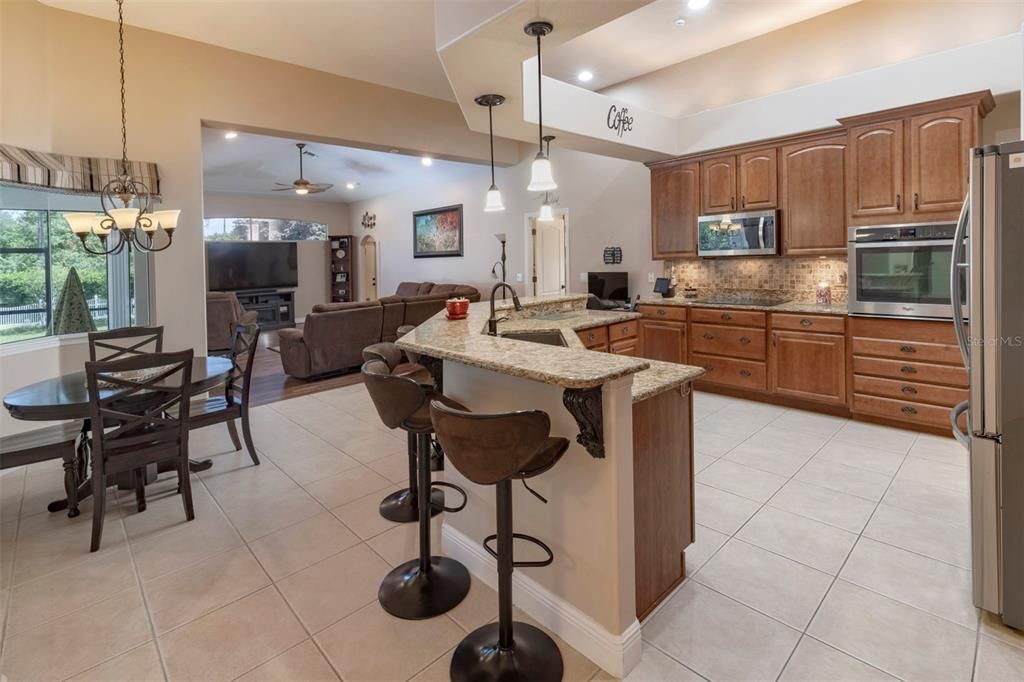 Kitchen with nook and family room