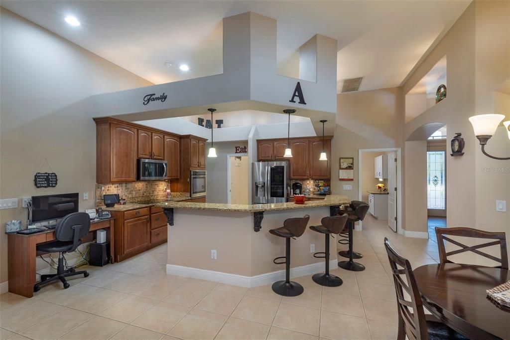 Kitchen with laundry room beyond