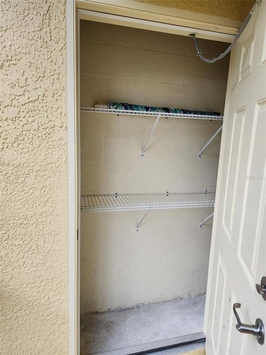 Porch storage closet.