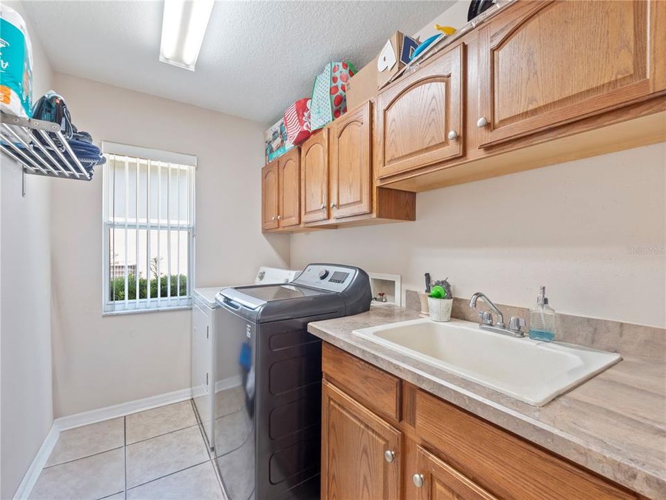 Laundry room with built in sink