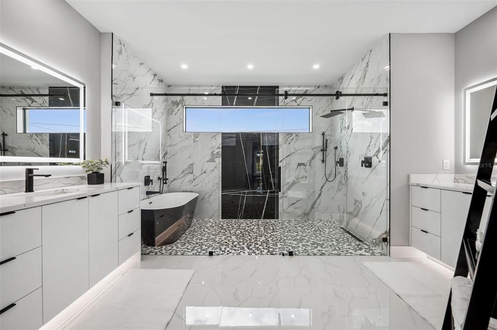 Master bath with wet room with separate soaking tub