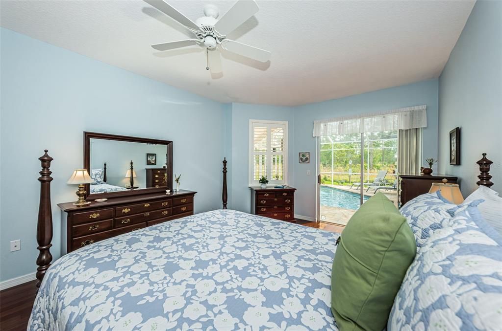 Master suite with pool access and preserve view