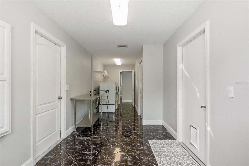 Oversized Laundry Room with Built-In Ironing Board