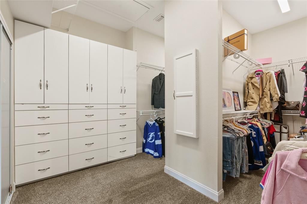 Primary Closet with Built-In Cabinetry