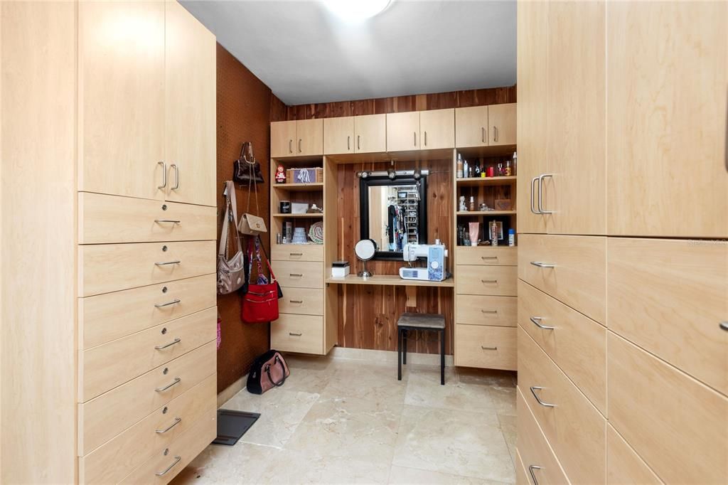 Primary walk in closet desk