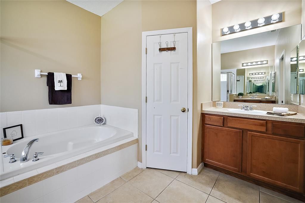 Primary Bathroom with Garden Tub and Linen Closet