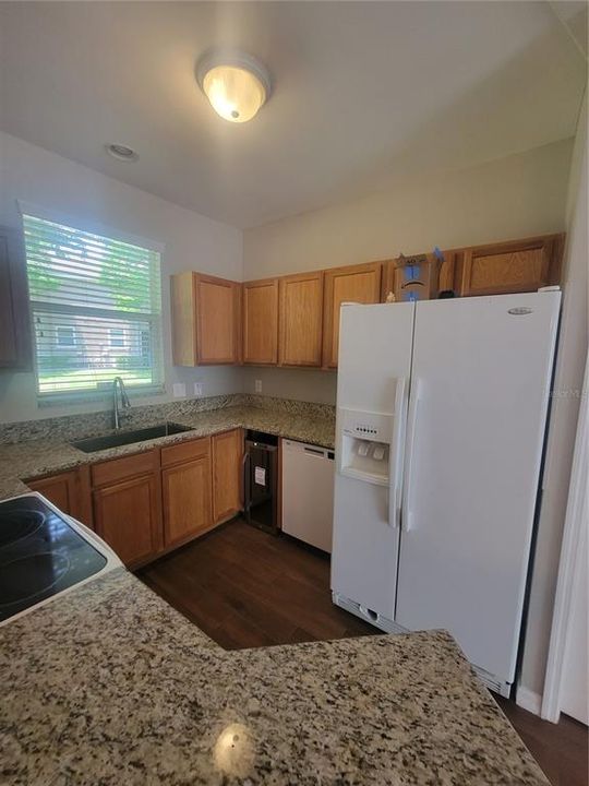 new granite counters, farmhouse sink, new refreshment fridge and all appliances, all appliances are recently replaced with energy efficient upgrades.