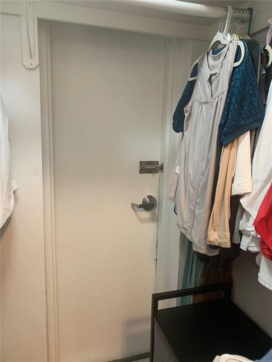 Master closet/ safe room with exit door