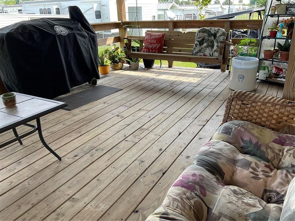 Covered deck with swing
