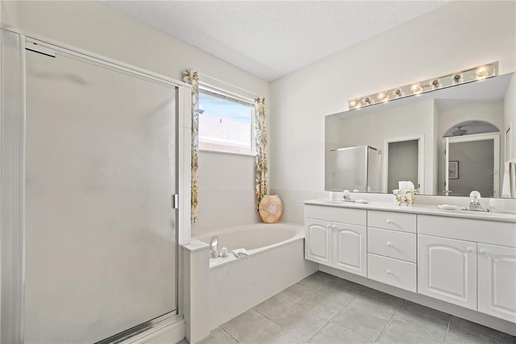 Primary Bathroom with Separate Shower, Tub and double sink vanity