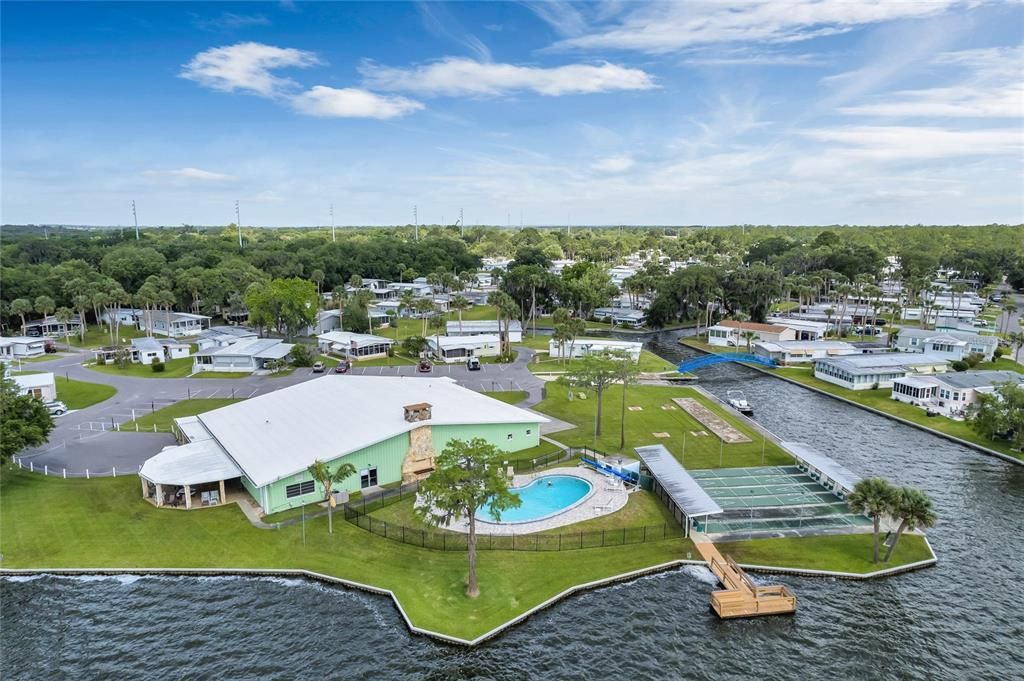 AERIAL VIEW OF CLUBHOUSE AND POOL