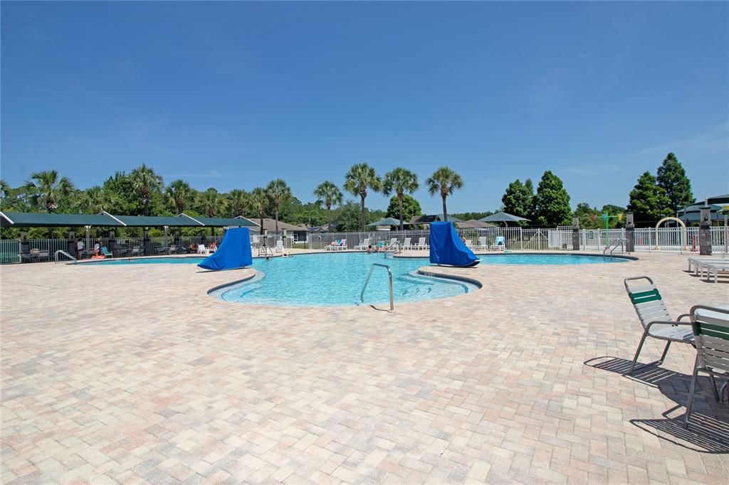 Beautiful Pool area with splash pad, playground, pickle ball and tennis courts