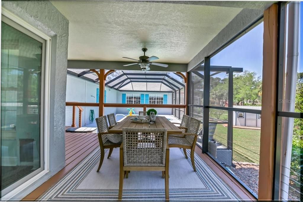 Covered deck leading to pool