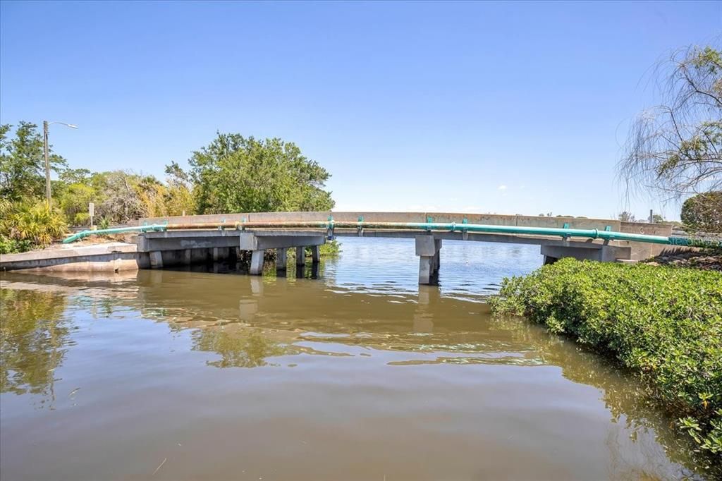 Fixed bridge leading to bayou and out to Anclote River and Gulf of Mexico