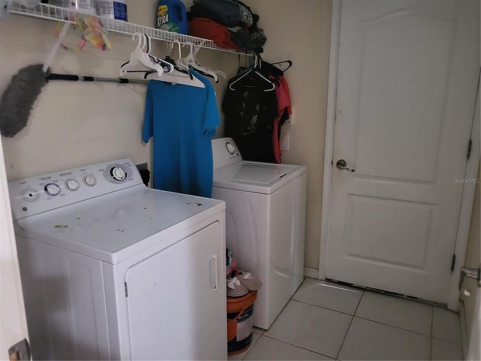 LAUNDRY ROOM AND ENTRY TO GARAGE