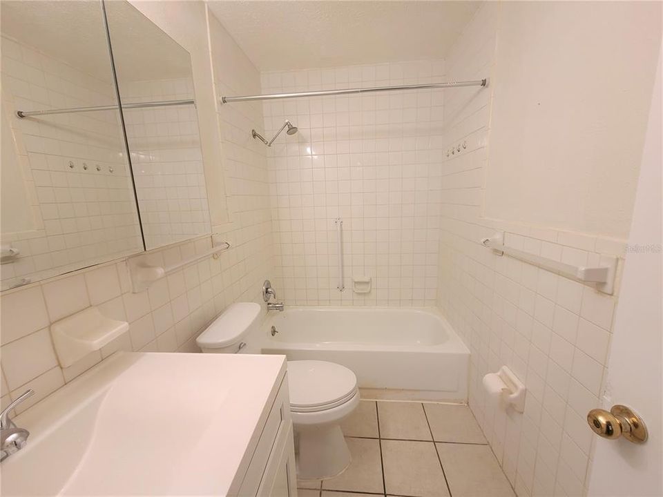 5828 - Bathroom with tub and shower