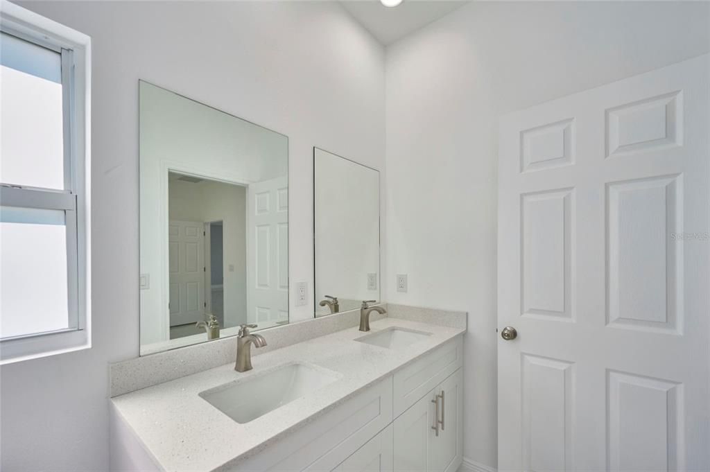 Master bathroom has double sink vanity