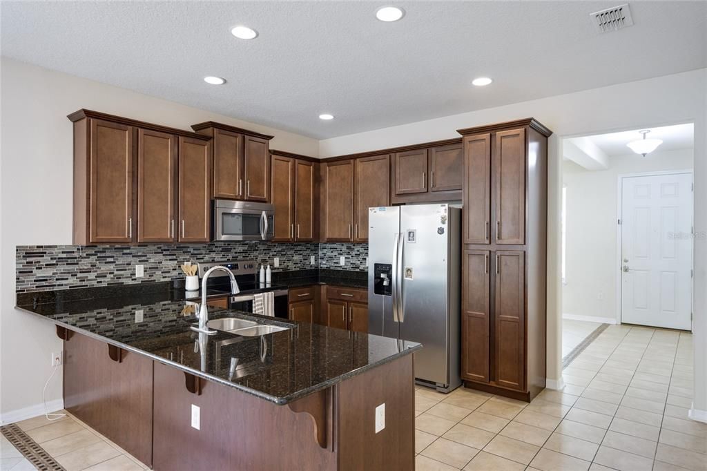 Beautiful granite counter tops, solid wood cabinets. Stainless steel appliances.