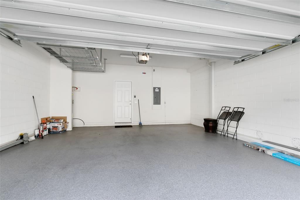 Garage: Acrylic flooring with high ceilings for storage