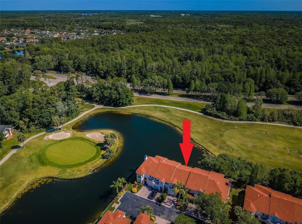 Townhouse overlooks 2nd hole on golf course