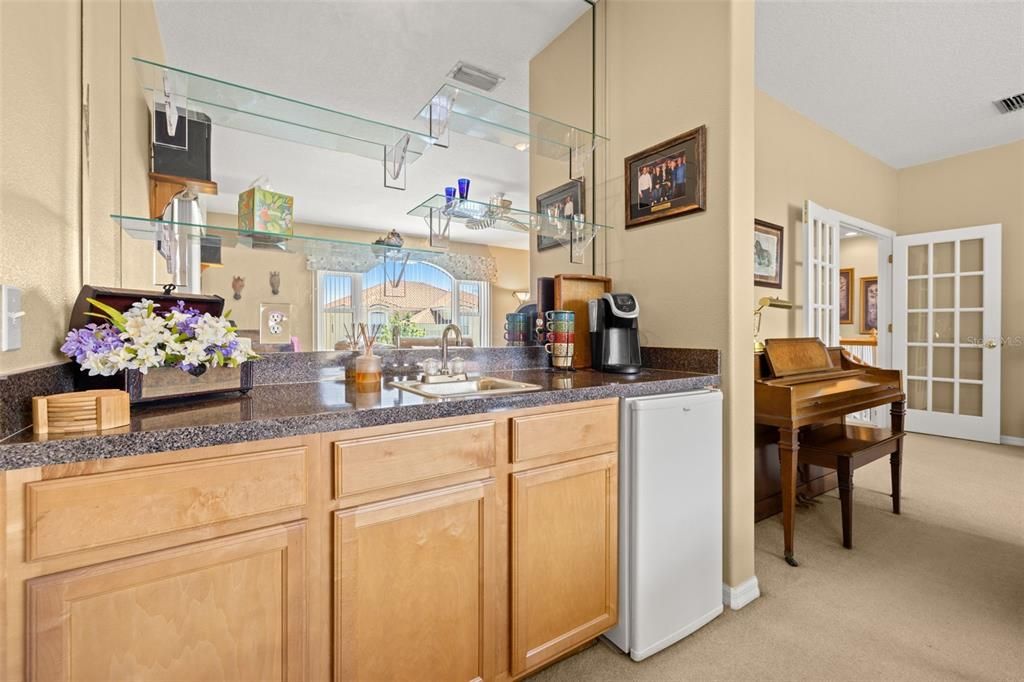 Wet bar and fridge for bonus room