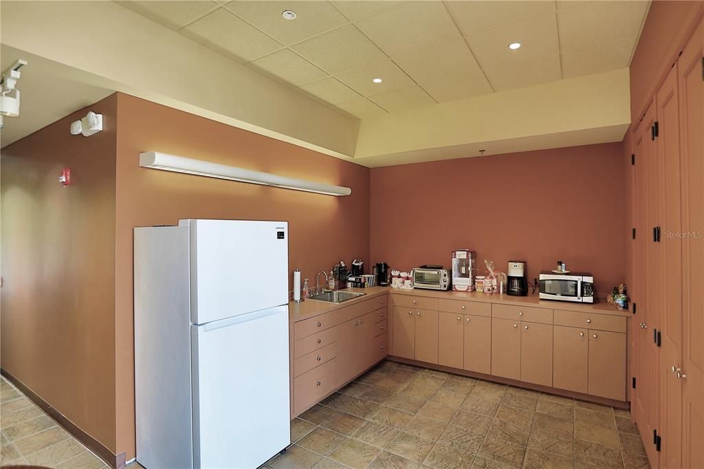 Kitchen/break room with area for table and chairs