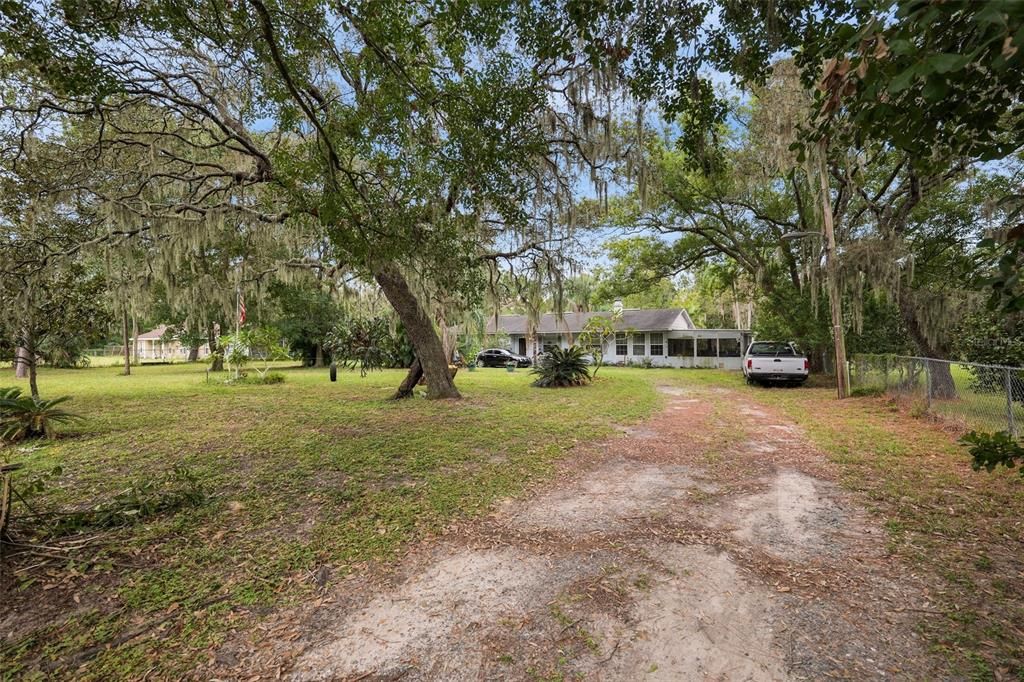 Enjoy your long driveway to your little over 1 acre property