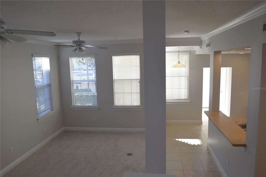 Family room adjacent to Kitchen.  Photo taken from stairs to the second floor bedrooms.