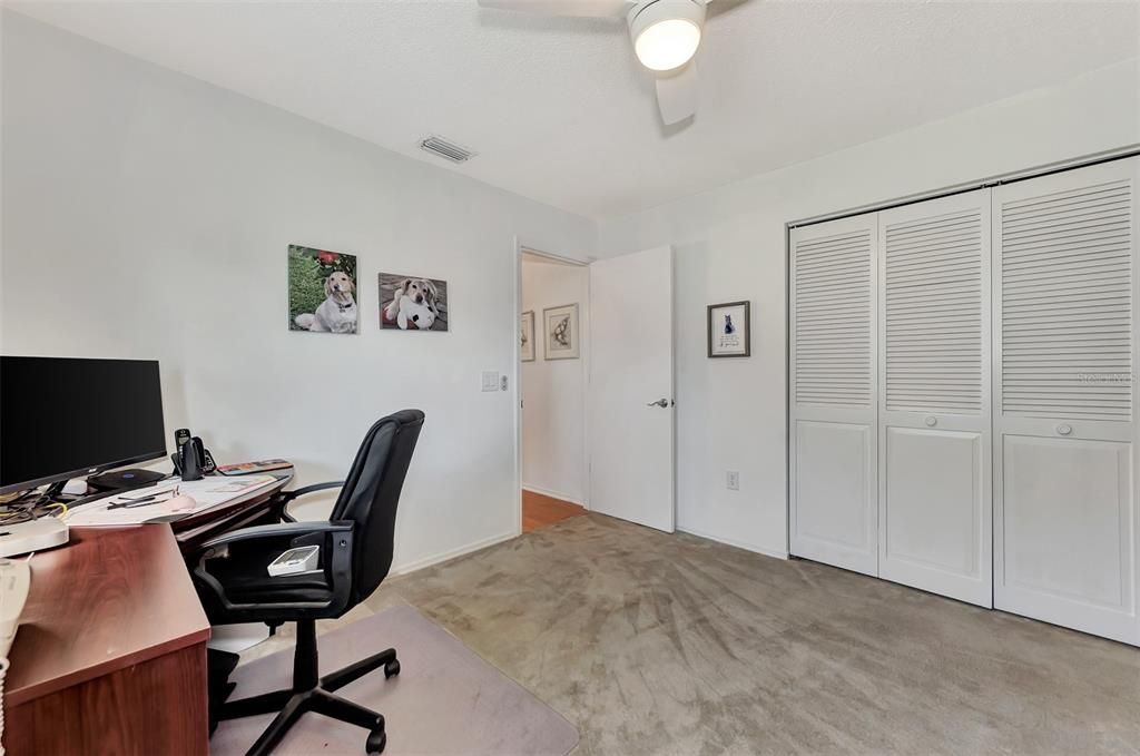 Bedroom with New Ceiling Fans and Wall to Wall Closets