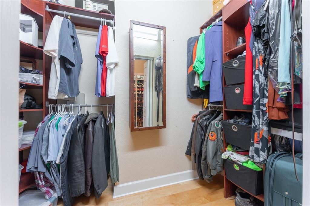 His Walk in Closet with Built in Closet System