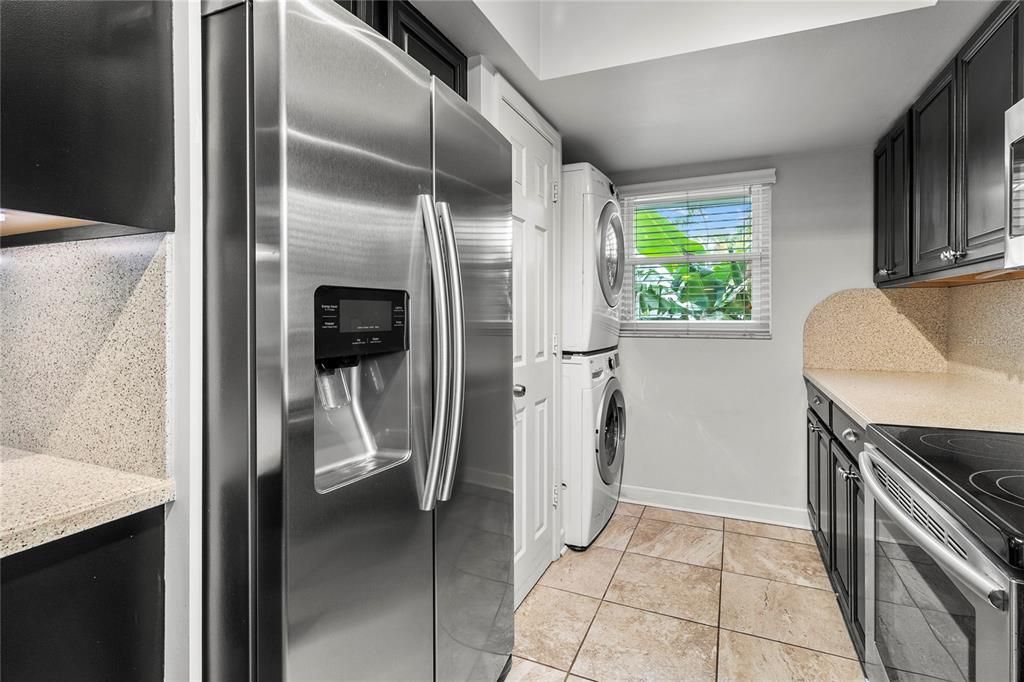 Kitchen with pantry closet.