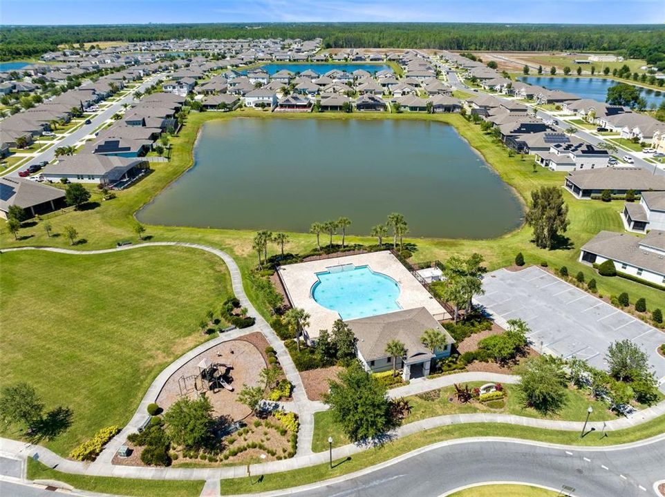 Enjoy the amenities of the community, including a sparkling pool and a playground, perfect for gatherings and recreation.