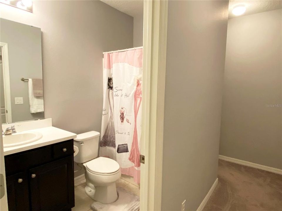 Master bathroom with separate private commode door