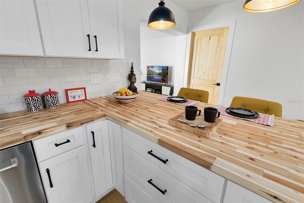 Stylish and durable butcher block style counters.