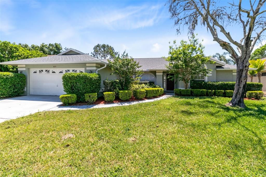 Beautifully landscaped front lawn.