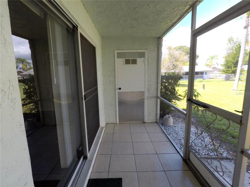 Screened lanai with storage closet.